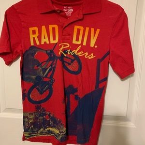 Boys short sleeve polo shirt. Trick bike design.